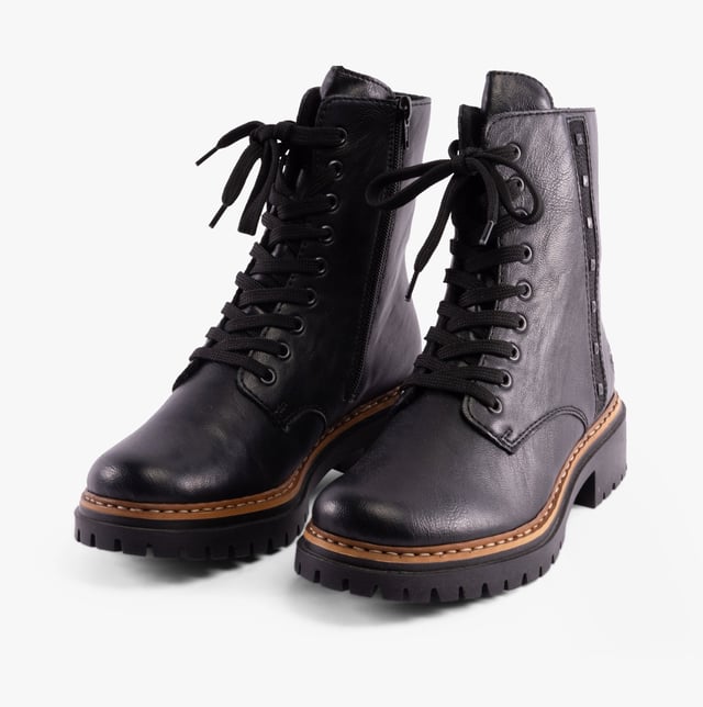 Rieker Rieker 72647-00 Womens Boots Black

 Upper Material: Synthetic Leather

Lining Material: Synthetic

Sole Material: Rubber

Closure/Fastening: Lace-Up

Features: Comfort

Heel Type: Block

Toe Shape: Round

Shoe Width: Relaxed

Item Weight: 0.8 KG

Heel Height: Low (2.5-4.9cm)

Shoe Shaft Height: Ankle

Boot Style: Ankle Boots

Gift Boxed: No
Product Code: 72647-00