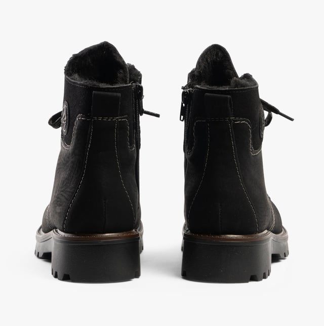 Rieker Rieker 73232-00 Womens Boots Black

 Upper Material: Faux Suede

Lining Material: Textile

Sole Material: Rubber

Closure/Fastening: Lace-Up

Features: Comfort,Warm Lining

Heel Type: Block

Toe Shape: Round

Shoe Width: Regular

Item Weight: 0.8 KG

Heel Height: Low (2.5-4.9cm)

Shoe Shaft Height: Ankle

Boot Style: Ankle Boots

Gift Boxed: No
Product Code: 73232-00