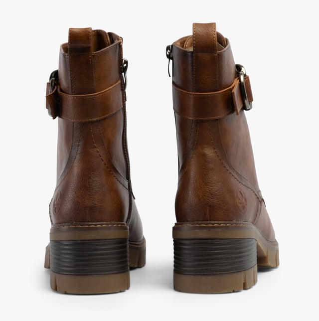 Rieker Rieker 92040-24 Womens Boots Brown

 Upper Material: Faux Leather

Lining Material: Textile

Sole Material: Rubber

Closure/Fastening: Lace-Up

Features: Comfort,Buckle

Heel Type: Block

Toe Shape: Round

Shoe Width: Regular

Item Weight: 0.8 KG

Heel Height: Low (2.5-4.9cm)

Shoe Shaft Height: Ankle

Boot Style: Ankle Boots

Gift Boxed: No
Product Code: 92040-24