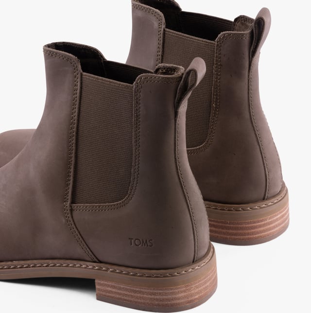 TOMS TOMS CHARLIE Womens Boots Green

 Upper Material: Leather

Lining Material: Textile

Sole Material: Rubber

Closure/Fastening: Pull-On

Features: Comfort,Elasticated Side Panel

Toe Shape: Round

Shoe Width: Regular

Item Weight: 1 KG

Heel Height: Flat (Under 2.5cm)

Shoe Shaft Height: Ankle

Boot Style: Chelsea Boots

Gift Boxed: No
Product Code: 10021304
