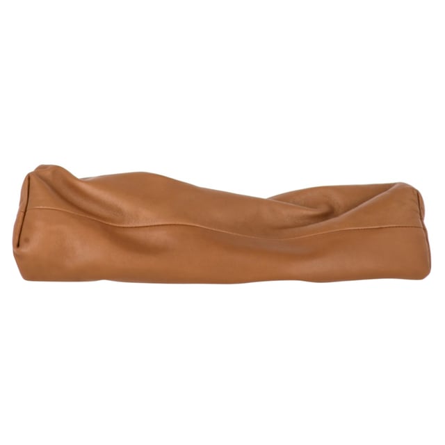 VINTAGE, RRP AS NEW

The Bottega Veneta Pouch in Brown Calfskin Leather is the epitome of understated luxury. Made in Italy from buttery-soft calfskin leather, this oversized clutch features a sleek, minimalist design that reflects the brand's rich leather craftsmanship. With a single compartment and a magnetic frame closure, it’s both practical and stylish.

with dust bag

Bottega Veneta Pouch in Brown Calfskin Leather
Condition: Excellent
Signs of wear: No retail tag, No visible sign of wear., 
Packaging: Dust bag
Color: Brown 
Material: Leather | leather
Size: One Size | One Size
Measurements: Width: 120; Height: 220; Length: 350
SKU: NAPPUGBBA452372W