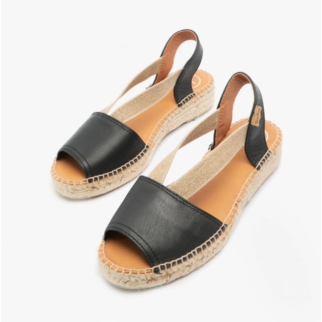 Toni Pons ETNA Ladies Leather Espadrille Sandals Black

 Upper Material: Leather

Lining Material: Fabric

Sole Material: Rubber

Closure/Fastening: Slip-On

Features: Comfort,Breathable

Heel Type: Wedge

Toe Shape: Round

Shoe Width: Regular

Item Weight: 0.66 KG

Heel Height: Flat (Under 2.5cm)

Sandal Style: Sandals

Gift Boxed: No
Product Code: ETNA-NEG