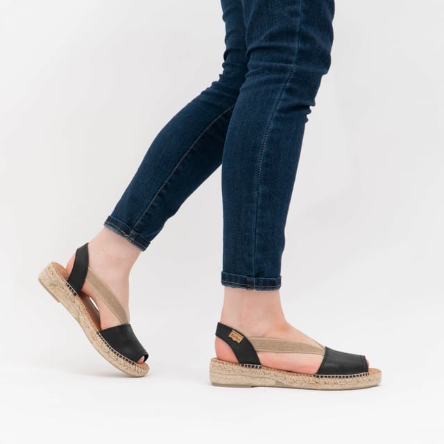 Toni Pons ETNA Ladies Leather Espadrille Sandals Black

 Upper Material: Leather

Lining Material: Fabric

Sole Material: Rubber

Closure/Fastening: Slip-On

Features: Comfort,Breathable

Heel Type: Wedge

Toe Shape: Round

Shoe Width: Regular

Item Weight: 0.66 KG

Heel Height: Flat (Under 2.5cm)

Sandal Style: Sandals

Gift Boxed: No
Product Code: ETNA-NEG