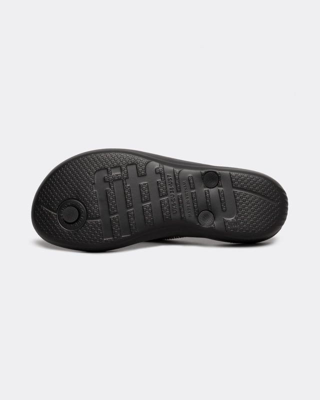 From the top, they look like your typical surfer-girl flip flops. Underneath, they’re engineered with iQushion™ air-foam cushioning, with impact pillows at high pressure areas, for non-stop comfort. These sparkly flip flops are adorned with micro-'crystals', throw a pair in your suitcase and you’ll find yourself wearing them to beach, bar and beyond. Waterproof and slip-resistant.Because of the design of this version, iQushion charms do not fit on these flip-flops.Sizing note: These iQushion flip-flops fit slightly small. If you fit between sizes, we recommend that you go up in size rather than down.
Upper Material:RubberLining Material:UnlinedFastening:Slip-OnOutsole:EVATechnology:iQushion
R08
 