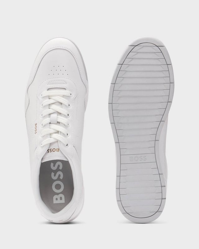 Easy to style with any ensemble, these running-inspired BOSS Menswear trainers are crafted in soft nappa leather. Perforated accents enrich this essential pair.

Laces
Fully lined
Packaging: Box

Upper material: 100% Cow skin, Lining: 100% Polyester, 85% Polyester, 60% Polyurethane, 40% Polyester, 15% Polyurethane, Sole: 100% Rubber, Innersole: 100% Polyester
50542099