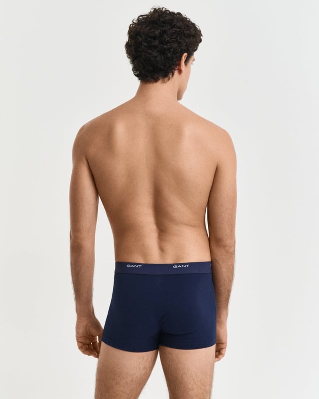 GANT's underwear delivers supportive, comfortable fits in high-quality fabrics. Made from a lightweight cotton stretch jersey, these 3-pack of trunks are a core GANT basic. They have a slim fit, regular waist and short leg length. The jacquard knitted elastic waistband is detailed with small repeating GANT logos.

Pack of three
Slim fit
Short leg length
Regular waist
Jacquard knitted elastic waistband

 95% Cotton, 5% Elastane 

900003333
 
 