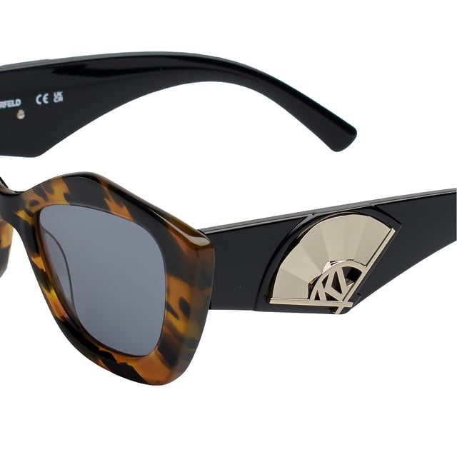 Karl Lagerfeld women's sunglasses with acetate frames.

 Shape and design:
 - These Karl Lagerfeld sunglasses have a cat-eye silhouette with sharp edges.
 - The cat-eye silhouette gives the sunglasses a modern and edgy look.

 Frame Material:
 - The frame of these glasses is made of acetate, a plastic material.
 - Acetate provides durability, flexibility and a smooth finish to the frame.
 - This makes the glasses durable and comfortable to wear.

 Acetate temples:
 - The temples are also made of acetate with metallic details, matching the frame material.
 - The acetate on the temples makes them light and comfortable to wear.

 Brand details:
 - Engraving of Karl Lagerfeld's initials on the temples.
 - Includes original case.

 Glasses:
 - The lenses are of high quality.
 - 100% UVB 400 protection.
 - Anti-reflective crystals.

 The color of the sunglasses lenses may vary slightly from the images due to lighting effects or adjustments in the material finish, but they will always retain their style and quality!
 Measures: Lens width: 52 mm, Bridge: 18 mm, Temples: 140 mm
 Composition: Acetate
 Care:
Clean the glasses with soap and water (neutral).
 Do not use dirty or abrasive cloths that may alter the characteristics of the filters.
 Use only original accessories and spare parts.