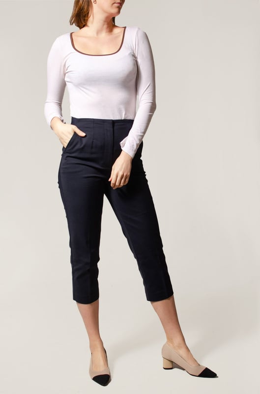 These trousers offer easy wear for smart and casual occasions alike. They have tapered legs with added stretch for comfort and an ankle-grazer length for a contemporary look. The elasticated high waist features double darts for a tailored effect and fastens securely with a hook bar and zip with a concealed button