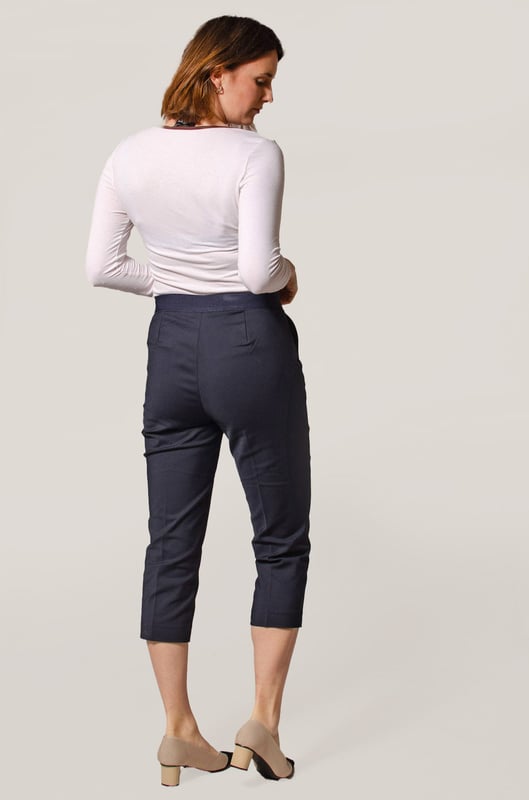 These trousers offer easy wear for smart and casual occasions alike. They have tapered legs with added stretch for comfort and an ankle-grazer length for a contemporary look. The elasticated high waist features double darts for a tailored effect and fastens securely with a hook bar and zip with a concealed button