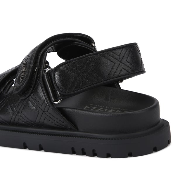 The Carvela Rosa Sandal is crafted in a black leather alternative. There is overstitch quilting in a diamond style across the upper straps. There is a gunmetal branding detail on the top strap.