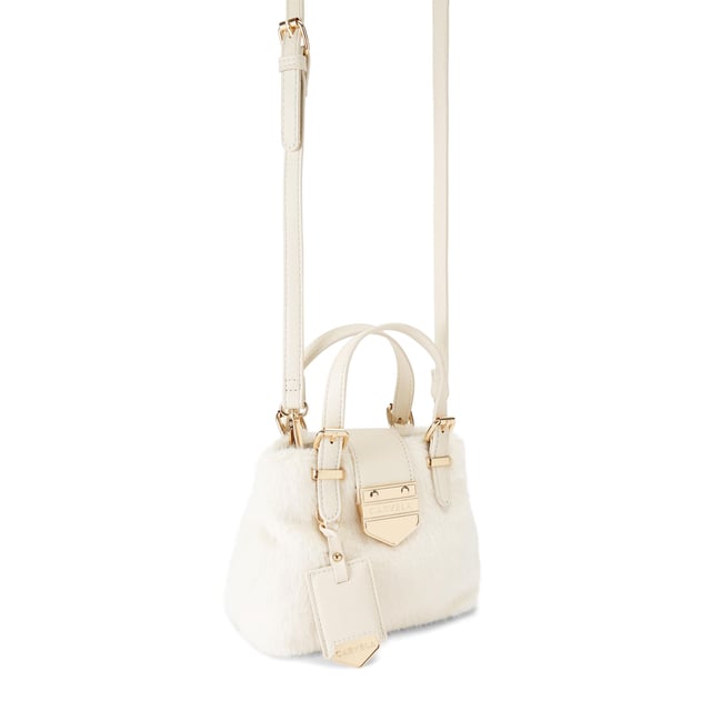 The Carvela Micro Maria Weave bag is a tote bag crafted from a white faux fur. There are metallic gold and leather alternative bone trims and luggage style tag on the front. Dimensions: 14cm (H), 17cm (W), 9cm (D). Strap length: 121cm.