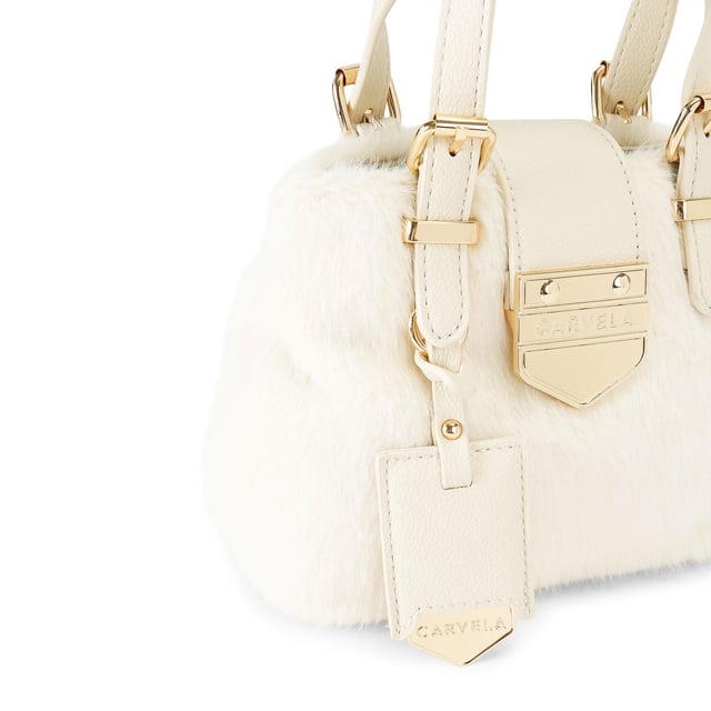 The Carvela Micro Maria Weave bag is a tote bag crafted from a white faux fur. There are metallic gold and leather alternative bone trims and luggage style tag on the front. Dimensions: 14cm (H), 17cm (W), 9cm (D). Strap length: 121cm.