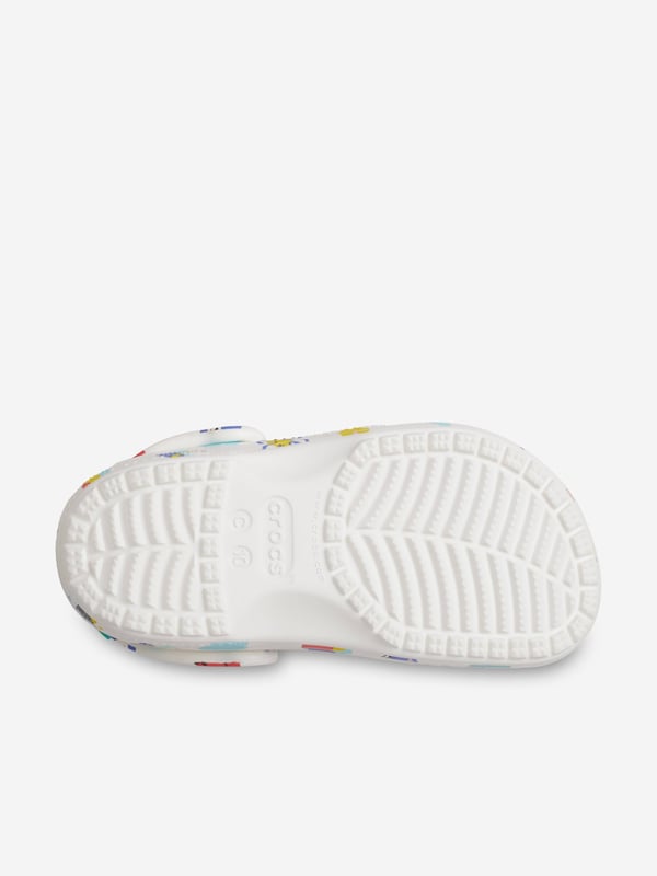 Introducing the Kids Classic Doodle Print Clog in White from Crocs, the perfect stylish and comfortable footwear choice for your child for AW2024. Here's why it's a must-have:‚Unique Doodle Design: Features fun  creative prints that pop against the classic white backdrop.‚Supreme Comfort: Crafted with Crocs‚ iconic Croslite‚ foam, offering a cushiony ride all day long.‚Versatile Wear: Ideal for both indoor Cosiness and outdoor adventures.‚Easy to Clean: Just soap and water, and they're ready for the next playful day.Step up your child‚ style game with these trendy clogs! Order now!