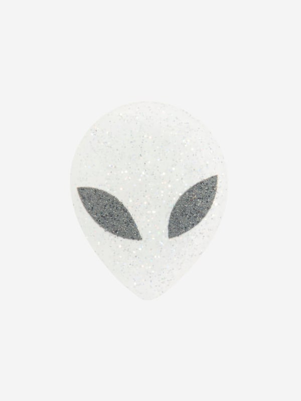 Elevate your Crocs with the Glitter Alien Jibbitz‚ charm! This cosmic accessory features a cute alien silhouette filled with sparkling glitter. Easy to insert and remove, it adds a playful touch to your footwear. Embrace the extra-terrestrial trend and personalise your Crocs with this eye-catching charm today!

NOTE: Sold Separately to Shoe

‚Not a Toy
‚Not Intended For Children Under 3 Years Of Age