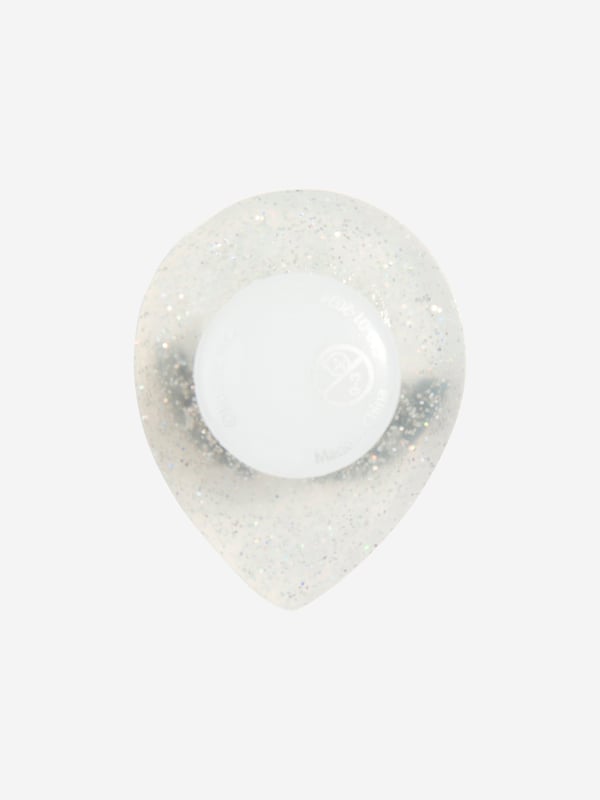 Elevate your Crocs with the Glitter Alien Jibbitz‚ charm! This cosmic accessory features a cute alien silhouette filled with sparkling glitter. Easy to insert and remove, it adds a playful touch to your footwear. Embrace the extra-terrestrial trend and personalise your Crocs with this eye-catching charm today!

NOTE: Sold Separately to Shoe

‚Not a Toy
‚Not Intended For Children Under 3 Years Of Age