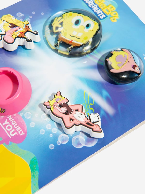 Add a burst of colour to your Crocs with the SpongeBob multi-coloured Jibbitz‚ charm pack. These vibrant accessories feature fun and durable designs. Easy to insert and remove, they are must-haves for fans of SpongeBob. Get yours today and bring joyful energy to your footwear!

NOTE: Sold Separately to Shoe

‚Not a Toy
‚Not Intended For Children Under 3 Years Of Age