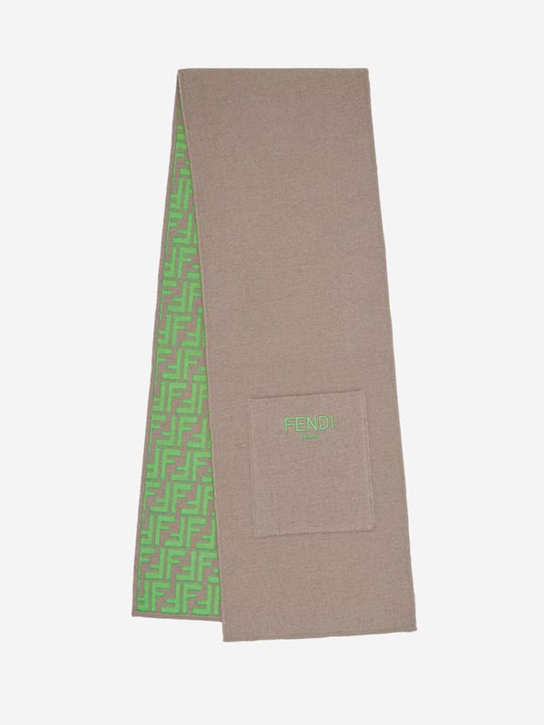 Discover the Kids Reversible FF Logo Scarf in Beige by Fendi - an essential addition to your unisex child's skiing wardrobe. With its unique features, it combines style with comfort:‚Italian Craftsmanship: Expertly made in Italy, promising superior quality, durability, and enduring wear. ‚Stylish Logo Print: The reversible FF logo pattern is playful, trendy, and ensures that the scarf remains a chic statement piece. ‚Top Comfort: Crafted from premium materials for superior comfort during winter adventures. ‚Boost Your Unisex Kids Wardrobe: Elevate your child's skiing attire with this fashionable Fendi scarf. Order today for standout style on the slopes.