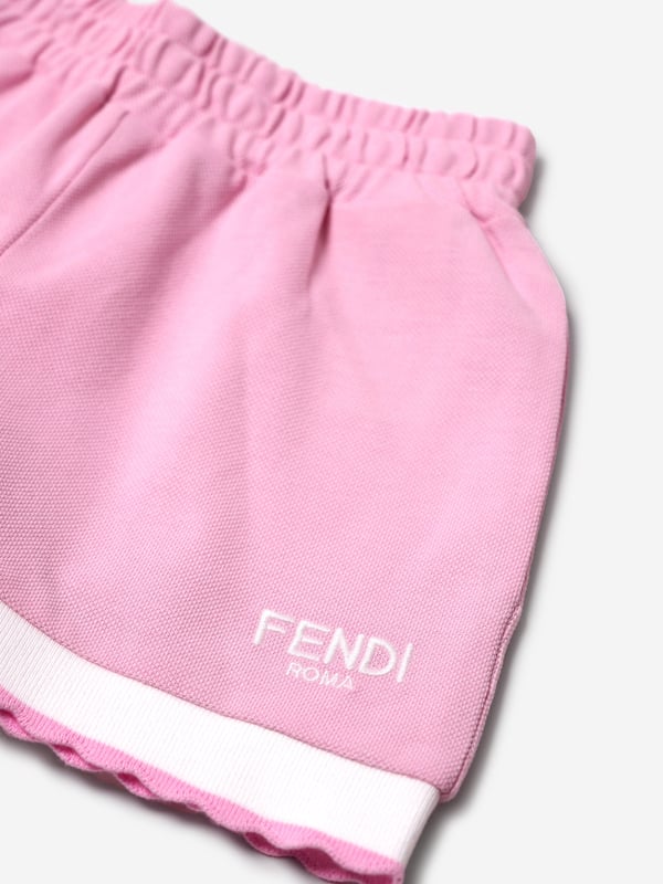 Introducing the exquisite Girls Logo Shorts in Pink by Fendi Kids, a splendid addition to your little girl's wardrobe for AW2024. Crafted in Italy, these shorts epitomize luxury and style. Key features include:‚Italian Elegance: Meticulously tailored in Italy, showcasing extraordinary craftsmanship and superior quality.  ‚Signature Style: Adorned with the iconic Fendi logo, these shorts are a symbol of high fashion.  ‚Pink Perfection: Rendered in a vibrant pink shade, ideal for adding a pop of colour to any outfit.  ‚Complete Comfort: Constructed from premium materials for unparalleled softness and comfort.Elevate her style with these chic Fendi Kids shorts!