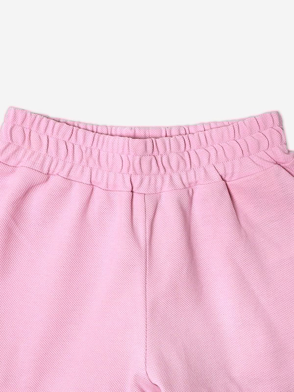 Introducing the exquisite Girls Logo Shorts in Pink by Fendi Kids, a splendid addition to your little girl's wardrobe for AW2024. Crafted in Italy, these shorts epitomize luxury and style. Key features include:‚Italian Elegance: Meticulously tailored in Italy, showcasing extraordinary craftsmanship and superior quality.  ‚Signature Style: Adorned with the iconic Fendi logo, these shorts are a symbol of high fashion.  ‚Pink Perfection: Rendered in a vibrant pink shade, ideal for adding a pop of colour to any outfit.  ‚Complete Comfort: Constructed from premium materials for unparalleled softness and comfort.Elevate her style with these chic Fendi Kids shorts!