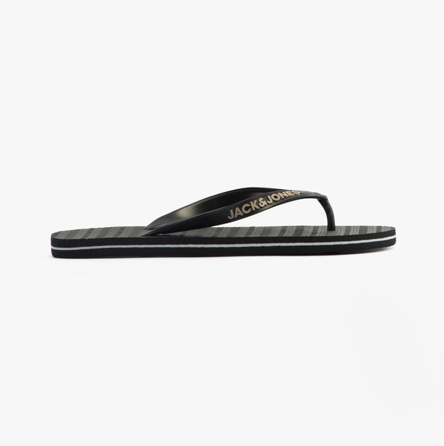 Jack &amp; Jones BASIC Mens Sliders Anthracite

 Upper Material: Rubber

Sole Material: Rubber

Closure/Fastening: Slip-On

Features: Comfort,Lightweight

Shoe Width: Regular

Item Weight: 1 KG

Heel Height: Flat (Under 2.5cm)

Sandal Style: Sandals

Gift Boxed: No
Product Code: 12230631-ANTHRCT
