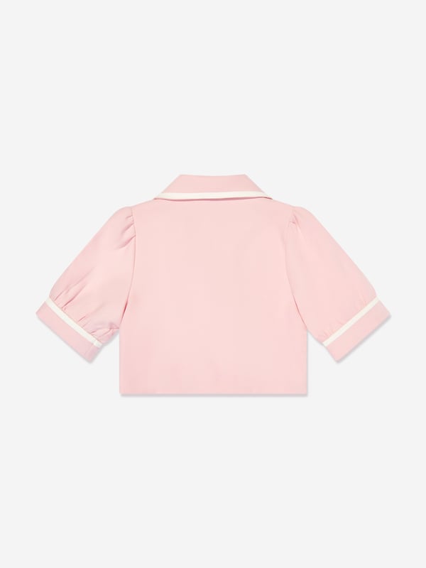 Mama Luma incorporate beautiful eco-friendly materials into their sophisticated handmade constructions. This girls pink shirt jacket is reflective of the Californian label's precision of beauty. It showcases a pointed collar, white trims, short puffy sleeves, large pearlescent buttons and front welt pockets.‚Cotton Lining ‚71% Polyester, 20% Viscose, 9% Elastane
