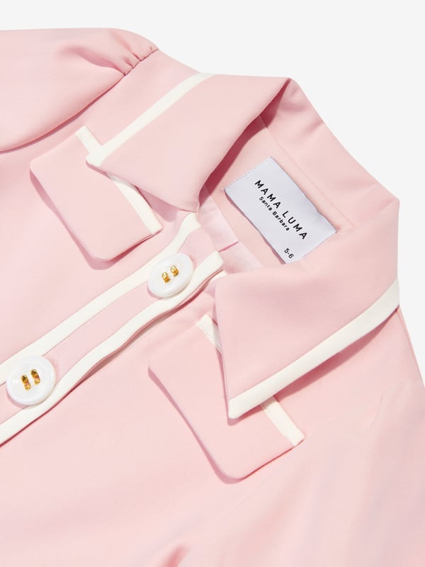 Mama Luma incorporate beautiful eco-friendly materials into their sophisticated handmade constructions. This girls pink shirt jacket is reflective of the Californian label's precision of beauty. It showcases a pointed collar, white trims, short puffy sleeves, large pearlescent buttons and front welt pockets.‚Cotton Lining ‚71% Polyester, 20% Viscose, 9% Elastane