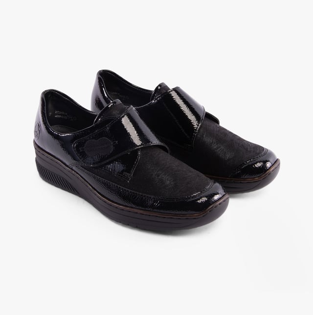 Rieker 487C0-00 Womens Shoes Black

 Upper Material: Faux Leather

Lining Material: Textile

Sole Material: Rubber

Closure/Fastening: Touch Fasten

Features: Comfort

Heel Type: Wedge

Toe Shape: Round

Shoe Width: Regular

Item Weight: 0.563 KG

Heel Height: Low (2.5-4.9cm)

Shoe Style: Casual

Gift Boxed: No
Product Code: 487C0-00