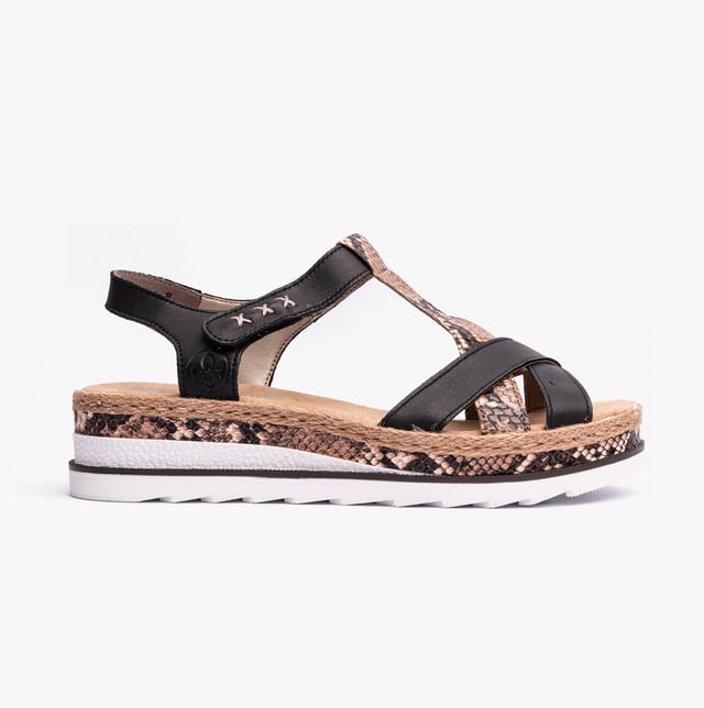 Rieker V7919-00 Womens Sandals Black

 Upper Material: Leather

Lining Material: Textile/Synthetic

Sole Material: Synthetic

Closure/Fastening: Slip-On,Touch Fasten

Features: Comfort,Breathable

Shoe Width: Regular

Item Weight: 1 KG

Heel Height: Low (2.5-4.9cm)

Sandal Style: Sandals

Gift Boxed: No
Product Code: V7919-00