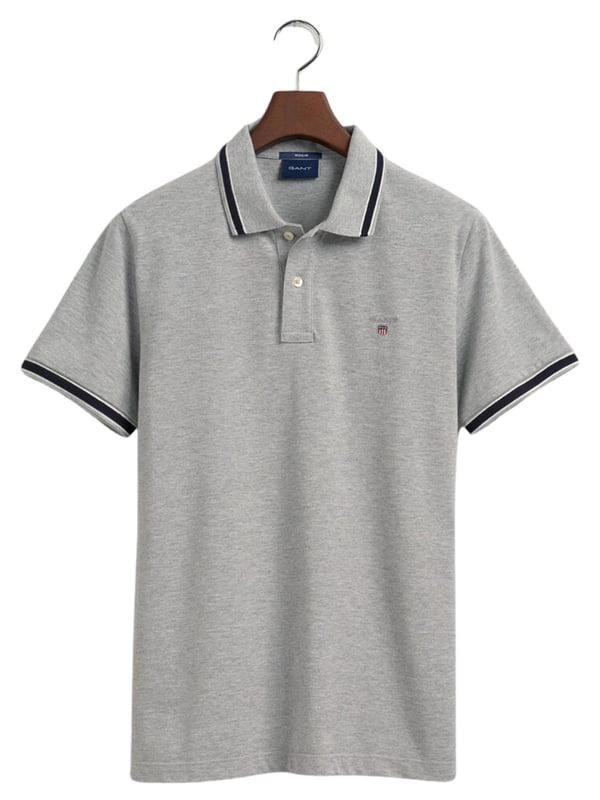 Elevate your wardrobe with our timeless Regular fit Short sleeves cotton piqué shirt. Featuring herringbone detailing on the collar and cuffs and an embroidered GANT shield on the chest, this sporty classic is made of lightweight, breathable fabric (2063005)
