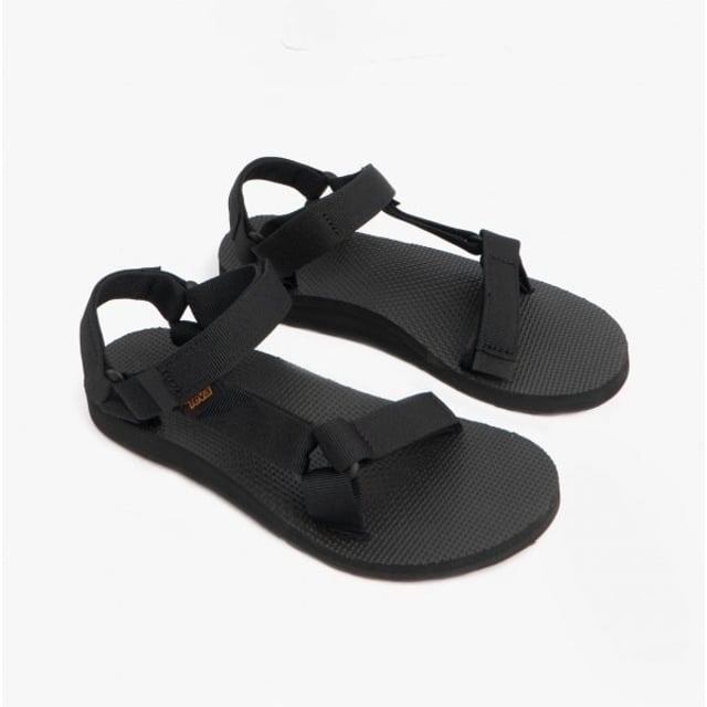 Teva ORIGINAL UNIVERSAL Ladies Sandals Black

 Upper Material: Textile

Sole Material: Synthetic

Closure/Fastening: Slip-On

Features: Lightweight,Vegan,Comfort,Breathable,Adjustable Strap

Toe Shape: Round

Shoe Width: Regular

Item Weight: 0.5 KG

Heel Height: Flat (Under 2.5cm)

Sandal Style: Sandals

Gift Boxed: No
Product Code: 1003987-BLK