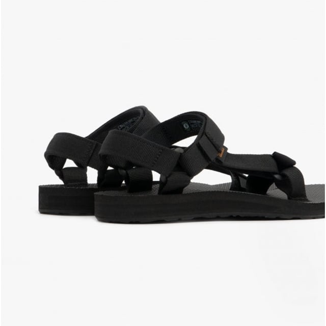 Teva ORIGINAL UNIVERSAL Ladies Sandals Black

 Upper Material: Textile

Sole Material: Synthetic

Closure/Fastening: Slip-On

Features: Lightweight,Vegan,Comfort,Breathable,Adjustable Strap

Toe Shape: Round

Shoe Width: Regular

Item Weight: 0.5 KG

Heel Height: Flat (Under 2.5cm)

Sandal Style: Sandals

Gift Boxed: No
Product Code: 1003987-BLK