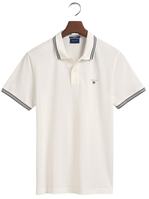 Elevate your wardrobe with our timeless Regular fit Short sleeves cotton piqué shirt. Featuring herringbone detailing on the collar and cuffs and an embroidered GANT shield on the chest, this sporty classic is made of lightweight, breathable fabric (2063005)
