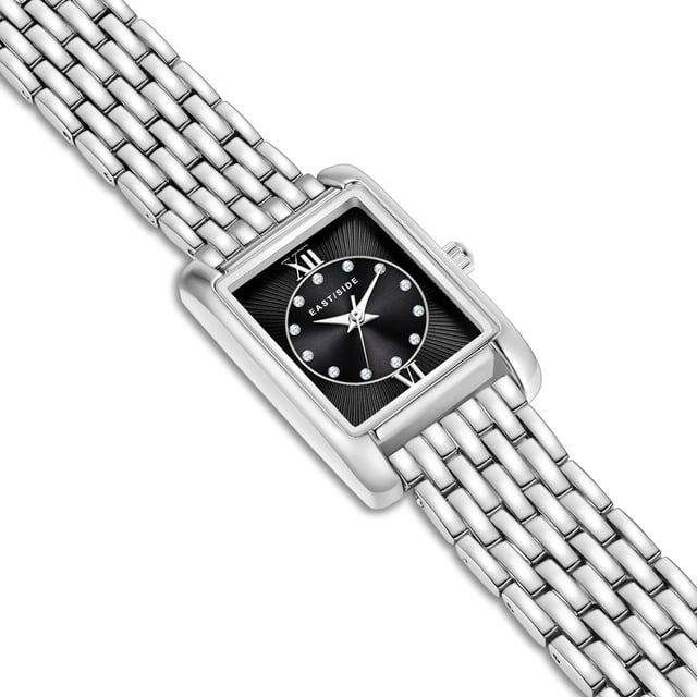 GENERAL INFORMATION:  • Targetgroup: Female  • Wristwatch: No Special Functions  • Display: analogue  • Weight of watch w/o box (gr.) - approx.: 55,0  MOVEMENT:  • Movement: Quartz  • Term of Movement: 2035  • Origin of movement: Japan  BRACELET:  • Material of bracelet/strap: Metal (Alloy)  • Plating of bracelet/strap: None  • Finishing of bracelet/strap: Smooth  • Finishing/Decoration of bracelet/strap: None  • Clasp/Closure/Buckle: Security-folding clasp  • Color of bracelet/strap: Silver  • Length of bracelet/strap (mm) approx.: 210,0  • Width of bracelet/strap (mm) approx.: 13,4  • Style/Design of bracelet/strap: Link bracelet  • Bracelet/strap adjustable?: No  CASE:  • Shape of case: Rectangular  • Size/Diameter of case in mm . approx.: 20,5 x 30,8  • Height of case in mm: 8,4  • Case material: Metal (Alloy)  • Surface of case: Polished  • Bezel/Topring: Fixed  • Finishing/Decoration of case: None  • Material of case back: Stainless steel  • Lock of case back: No screwed-in crown  • Color of case: Silver  • Coating/Plating (Case): None  • Type/Form of crystal: Flat  • Material of crystal: Mineral crystal  DIAL:  • Size jewelry care cloth: Hour, Minute, Second  • Indices: Roman numerals/points  • Material of dial: Brass  • Structure/pattern of dial: Flat/sunray  • Color of dial: Black  PUSHER, CROWN, HAND:  • Pusher: None  • Corrector: No  • Crown: No screwed-in crown  • Type of hands: Dauphine hands  • Luminescent (hands): No  PACKAGING & SCOPE OF DELIVERY:  • Box: Yes  • Service booklet: Yes  • Manual: Yes