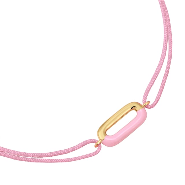 Do you love unique pieces of jewelry with a touch of extravagance? Then this textile bracelet from the Glanzstücken München brand will delight you. The delicate, pink textile strap brings a playful lightness that adorns every wrist. The pendant made of yellow gold-plated 925 sterling silver (14 carat) and complements the pink enamel perfectly. The interplay of shiny gold and bright pink gives the bracelet a timeless elegance. Thanks to the practical drawstring closure, the bracelet can be easily put on and individually adjusted. Wear it as a fashion statement or combine it with other pieces of jewelry - this bracelet is guaranteed to turn heads.