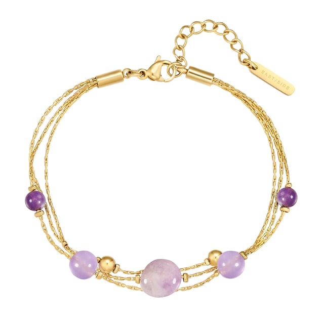 Do you prefer stylish fashion jewelry with wow potential? Then this necklace from the EAST/SIDE label is exactly your thing! The multi-row design with the magical magic of gemstones draws everyone's attention to your décolleté: three link chains combine with round-cut amethyst stones and stainless steel beads - an eye-catcher that also impresses with its pleasantly smooth feel. All stainless steel elements are easy to clean and robust and finished with a high-quality 14-carat yellow gold finish. Thanks to the extension chain with a comfortable lobster clasp, the length of the chain can be adjusted quickly and easily.