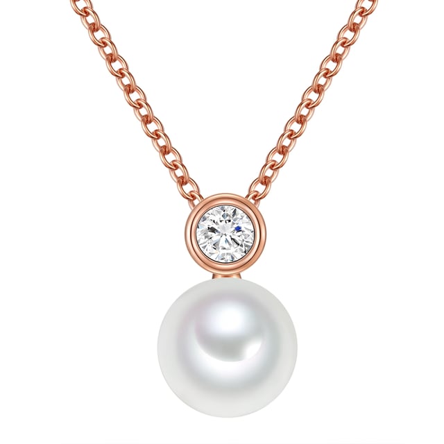 Femininity staged in a modern way-this extravagant necklace trailer combination by Valero Pearls cannot be described more aptly. The ultrafine anchor chain members made of rose -gilded 925 sterling silver nestle almost weightlessly on the neck game and are still solid enough to keep the imposing trailer. This impresses visually through its feminine curves, which are generated by the use of a rounded zirconia crystal in frame and the freshwater breeding pearl stored below. This shows glitter and glamor in their most desirable form.