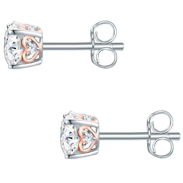 Timeless earrings is a basic for every jewelry box - like these bicolor ears of the Trilani label. The precisely faceted zirconia crystal conjures up a beguiling glitter on your earlobes. A symbolic detail for the second glance is the heart motif integrated in the side. Made of 925 sterling silver and rhodium and rose gold, the earrings in fans of silver and gold jewelry scores alike. The plugs can be carried for the office look as well as with casual leisure outfits. A practical plug -in closure simplifies and puts it on - for the best comfort.