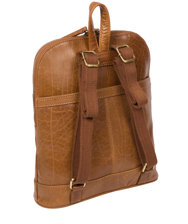 Handcrafted from natural leather for a beautifully textured finish the 'Francisca' backpack from Conkca London features plentiful on-the-go storage. The main zipped compartment comes lined with natural and untreated 100% cotton with two interior pockets, ideal for a smartphone and keys. Dual zips on the front of the backpack provide extra storage solutions. Comes with adjustable and durable fabric shoulder straps finished with the inimitable Conkca squirrel logo and charm.