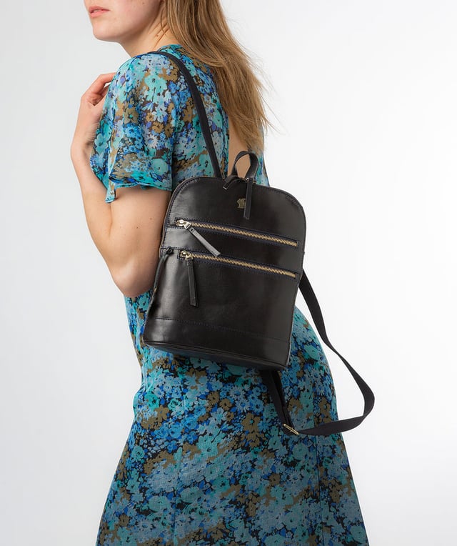 Handcrafted from natural leather for a beautifully textured finish the 'Francisca' backpack from Conkca London features plentiful on-the-go storage. The main zipped compartment comes lined with natural and untreated 100% cotton with two interior pockets, ideal for a smartphone and keys. Dual zips on the front of the backpack provide extra storage solutions. Comes with adjustable and durable fabric shoulder straps finished with the inimitable Conkca squirrel logo and charm.