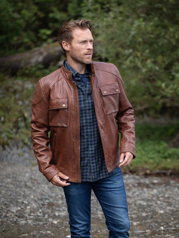 Expertly crafted from fine aniline leather, the Burnmoor jacket exudes rugged sophistication. This classic jacket features a concealed centre zip fastening with a press stud placket, as well as press stud and zip pockets for stylish practicality. Shoulder panel detailing and branded brass-tone hardware complete this timeless look.