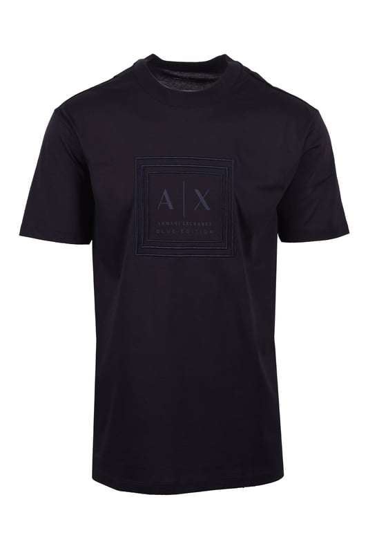 Armani Exchange Jersey T-shirt in Deep Navy
Elevate your casual wardrobe with the Armani Exchange Deep Navy Jersey T-Shirt. Crafted from 100% mercerised cotton, this regular-fit tee offers a refined take on everyday comfort. The mercerised treatment provides a subtle sheen and enhanced durability, ensuring a luxurious feel that lasts.
 
Designed for effortless style, this t-shirt features a classic round neck and short sleeves, making it a versatile staple for any occasion. The deep navy hue exudes sophistication, while the iconic Armani Exchange logo on the chest adds a touch of modern branding.
 
Features

Premium Mercerised Cotton: 100% cotton fabric with a polished finish and increased strength.
Classic Regular Fit: Comfortable and flattering silhouette.
Armani Exchange logo on the chest 
Deep Navy Color
Style code: XM000358