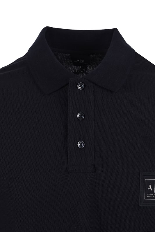 Armani Exchange Blue Edition Polo in Deep Navy
Elevate your casual wardrobe with the Armani Exchange Blue Edition Polo in a sophisticated Deep Navy. This regular fit polo is a timeless classic, crafted from a breathable cotton blend piqué fabric that ensures all-day comfort, no matter the season.

 
Features

Colour: Deep Navy
Fit: Regular Fit
Fabric: 100% Cotton Piqué
Rib Details: 99% Cotton, 1% Elastane
Sleeves: Short Sleeves
Detail: Logo label on chest
Style code: XM000356