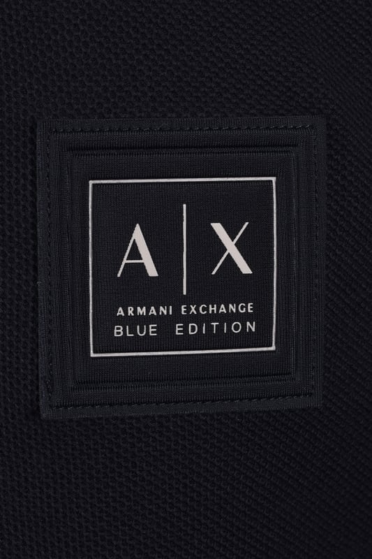 Armani Exchange Blue Edition Polo in Deep Navy
Elevate your casual wardrobe with the Armani Exchange Blue Edition Polo in a sophisticated Deep Navy. This regular fit polo is a timeless classic, crafted from a breathable cotton blend piqué fabric that ensures all-day comfort, no matter the season.

 
Features

Colour: Deep Navy
Fit: Regular Fit
Fabric: 100% Cotton Piqué
Rib Details: 99% Cotton, 1% Elastane
Sleeves: Short Sleeves
Detail: Logo label on chest
Style code: XM000356
