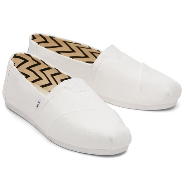Our day one women's Alpargata slip-on is now designed with materials to bring maximum comfort to your day-to-day shoe. Step into these espadrilles in black recycled cotton canvas, and spark change with every stride.