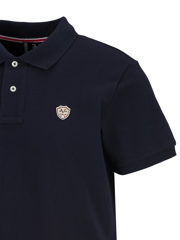 Het 19v69 ITALIA poloshirt *EMILIO* maakt indruk met zijn tijdloze stijl en hoge comfort. De polokraag met knoopsluiting geeft het shirt een elegante touch, terwijl de zachte katoenen stof en de normale pasvorm zorgen voor een perfecte pasvorm, ideaal voor vrije tijd en zaken.