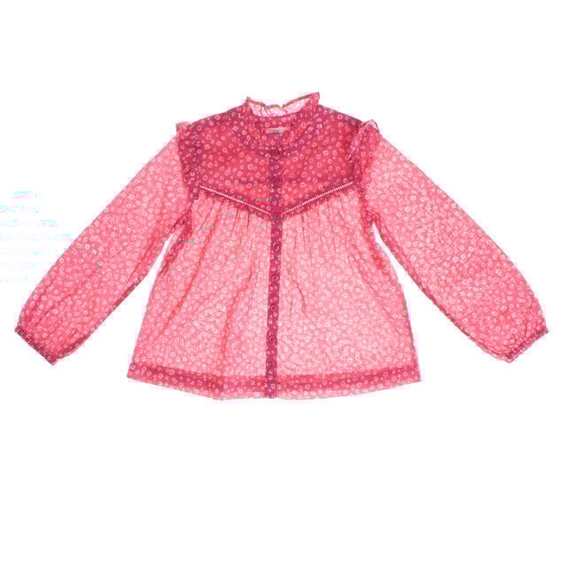 Girl's blouse with a delicate floral design that stands out for its romantic and feminine style.

 Made from a lightweight, semi-sheer fabric, this garment features a print of small flowers on a contrasting background on the yoke, adding a touch of depth.

 It features a front button closure that adds elegance and practicality.

 Long, slightly puffed sleeves end in elasticated cuffs for a comfortable fit.

 The gathered high neck and ruffles on the shoulders complete this charming and sophisticated look, ideal for special occasions or to add a unique touch to any outfit.
 Composition: 100% Cotton
 Care:
- Machine wash max. 30ºC..
 - Use similar colors in the wash.
 - Avoid the use of bleaches.
 - Dry at low temperature.
 - Iron at low temperature.
 - Do not dry clean.