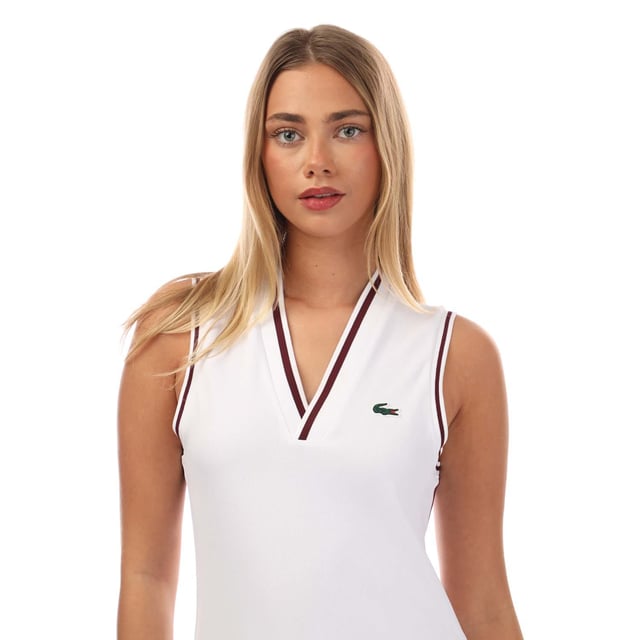 Women's Lacoste Sport Pique Tennis Dress.- Dress with Removable Piqué Shorts.- Recycled polyester fabric made from manufacturing offcuts.- Contrasting V-neck.- Quick drying Tested by tennis players.- Silicone crocodile on chest. Material: 97% Polyester, 3% Elastane. Ref: EF1031BED.