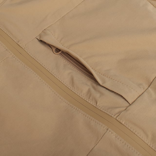 Children's windbreaker jacket with a functional and modern design, ideal for cool climates.

 Made from a lightweight and durable material, it features an adjustable hood for added protection from wind and rain.

 The full-zip front closure makes it easy to wear, while the front slanted pockets, along with an additional zippered chest pocket, provide extra storage space for small items.

 Long sleeves and a straight cut offer comfort and freedom of movement, making this jacket a versatile and practical choice for everyday wear or outdoor activities.
 Composition: Exterior: 94% Nylon, 6% Elastane; Interior: 100% Polyester
 Care:
- Machine wash cold on delicate cycle.
 - Use mild detergents.
 - Use dryer at low temperature.
 - Iron at low temperatures.
 - Do not dry clean.