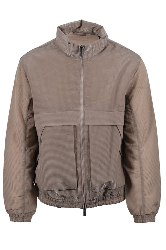 Armani Exchange Woven Blouson Jacket in Roasted Cashew
Elevate your casual wardrobe with the refined simplicity of the Armani Exchange Woven Blouson Jacket. In a sophisticated Roasted Cashew hue, this jacket delivers a modern, understated look perfect for versatile styling.
 
Crafted from a high-quality woven material, this blouson jacket offers a lightweight yet durable layer of warmth. The classic blouson silhouette is complemented by a practical zip-front closure, allowing for effortless wear and adjustable comfort. Two convenient side pockets provide essential storage for your everyday essentials.
 
Features

Colour: Roasted Cashew
Style Code: XM000389
Material: Woven Fabric
Closure: Zip-front
Pockets: Two side pockets
Silhouette: Blouson
Style code: XM000389