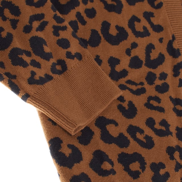 This girls' knitted cardigan is a long-sleeved, open-front garment with no closure, offering a relaxed and modern style.

 It features a soft fabric design, ideal for providing all-day comfort.

 The ribbed cuffs and hem add a structured touch to the garment, while its slightly loose fit makes it perfect for layering.

 This lightweight jacket is ideal for complementing any casual outfit, providing a versatile and comfortable touch.
 Composition: 100% Cotton
 Care:
- Machine wash cold on delicate cycle.
 - Use mild detergents.
 - Use dryer at low temperature.
 - Iron at low temperatures.
 - Do not dry clean.